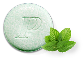 Un comprimido reductor de ácido masticable Pepcid Complete® con sabor a menta fresca.