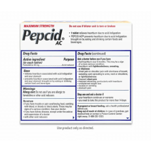Drug facts uses warnings and dosage on a Maximum Strength Pepcid AC® package.